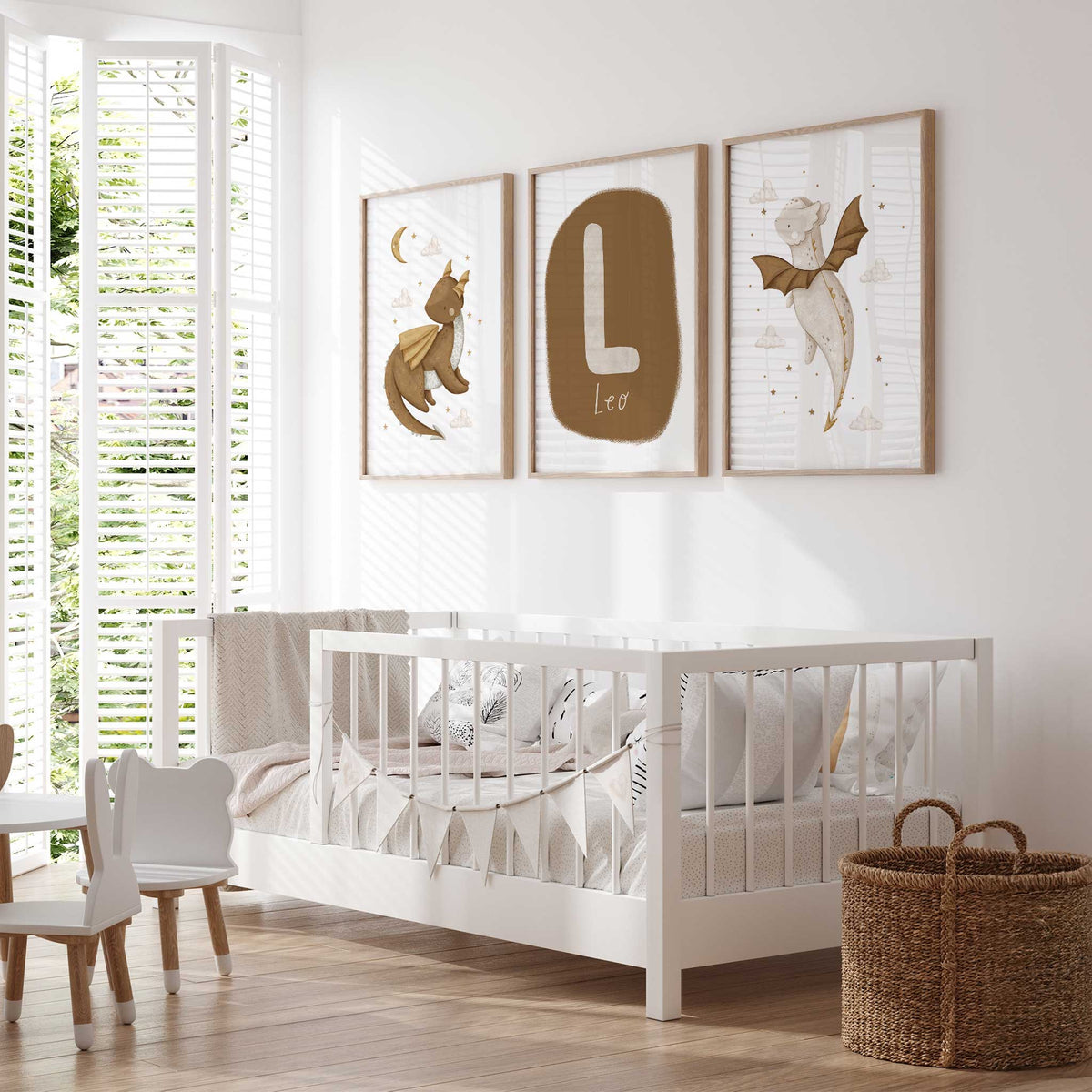 Three personalised dragon nursery prints combining brown and cream baby dragons, celestial details and a name and initial design.
