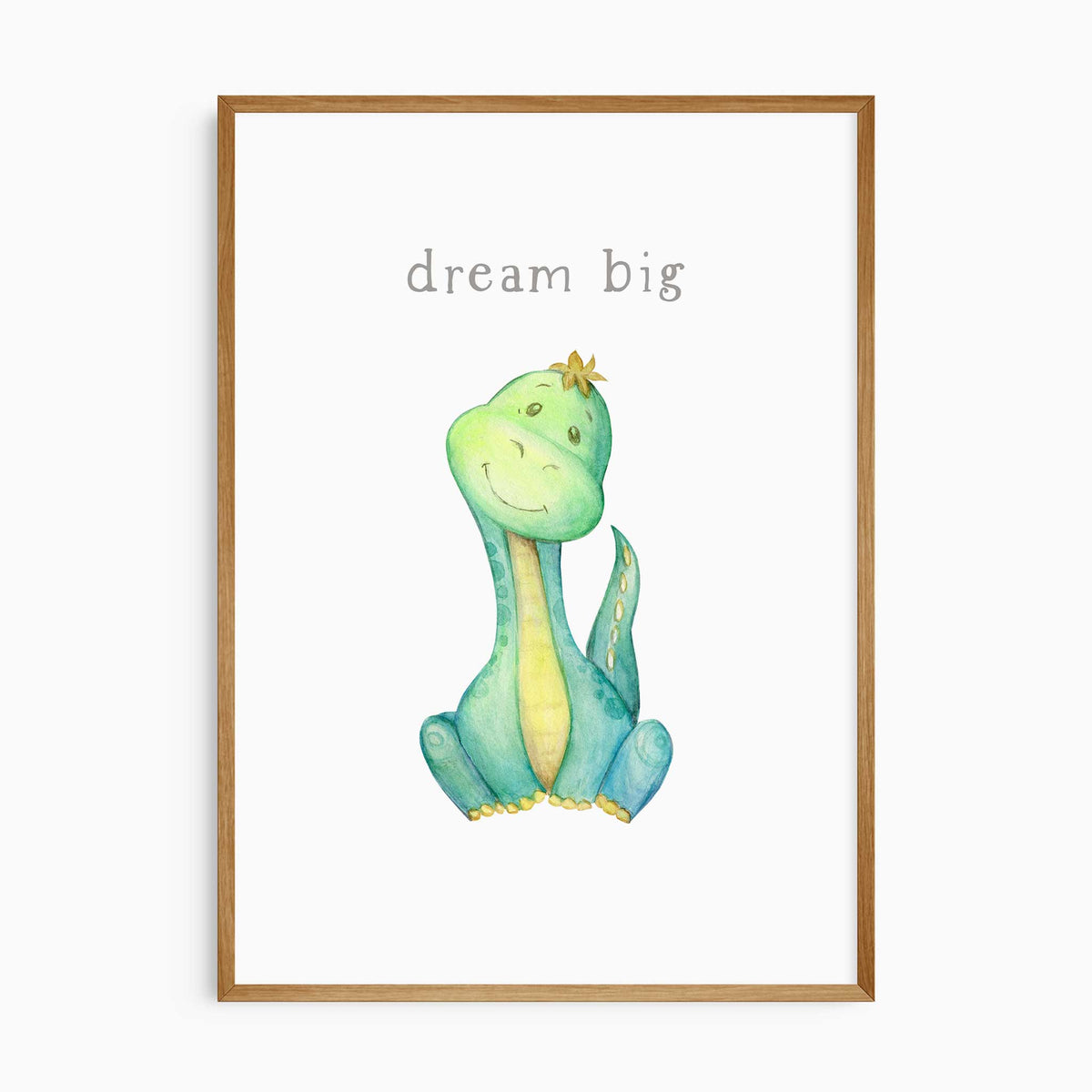 Green and turquoise baby dinosaur sitting beneath the grey words Dream big on a white background in watercolour style.