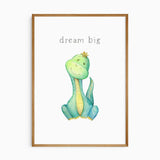 Green and turquoise baby dinosaur sitting beneath the grey words Dream big on a white background in watercolour style.