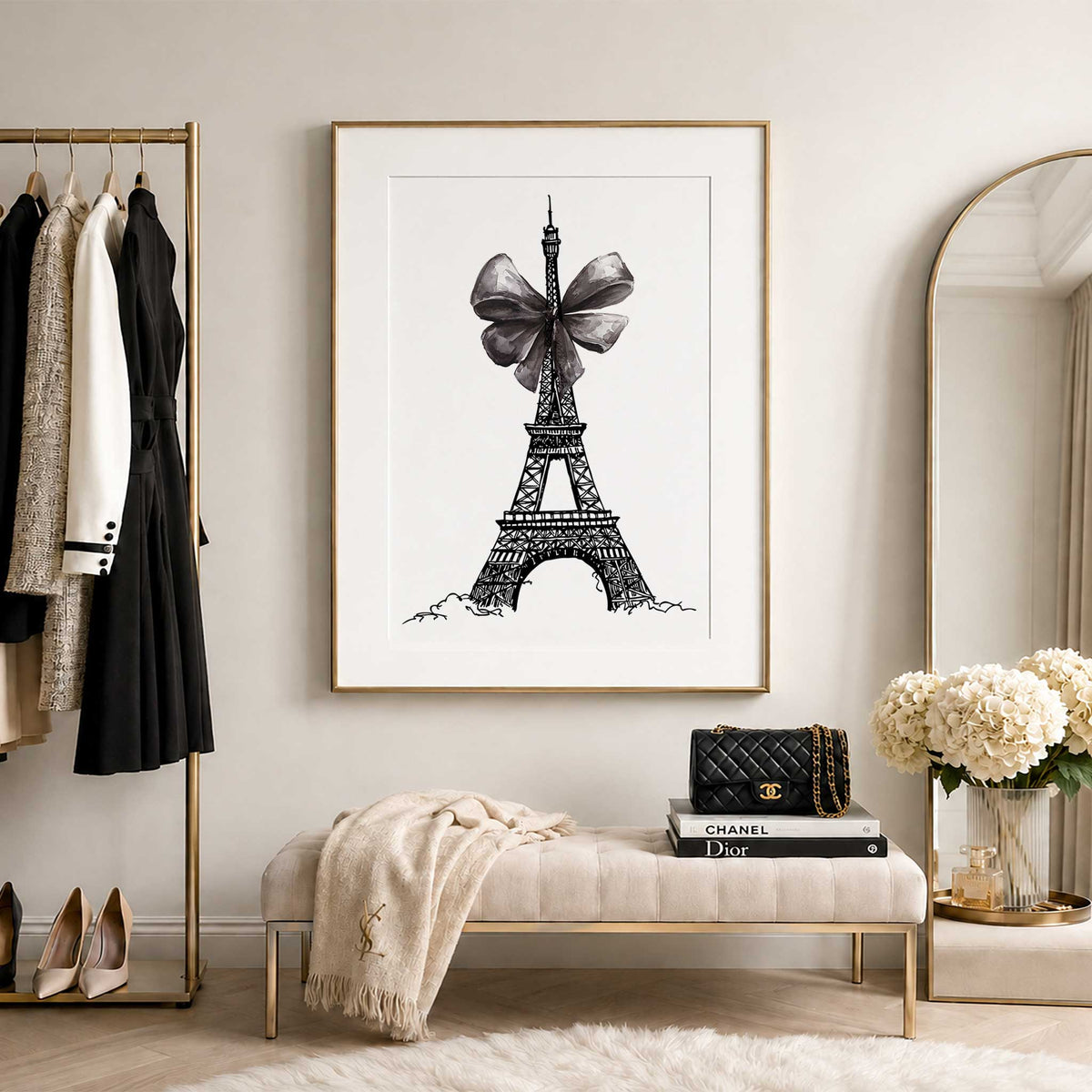 Detailed black Eiffel Tower fashion illustration decorated with a large textured grey ribbon bow on a white background.