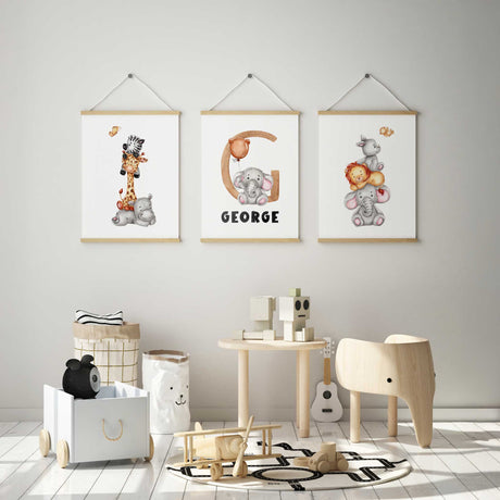Watercolor elephant, giraffe, and lion stacked as nursery wall prints for kids' rooms