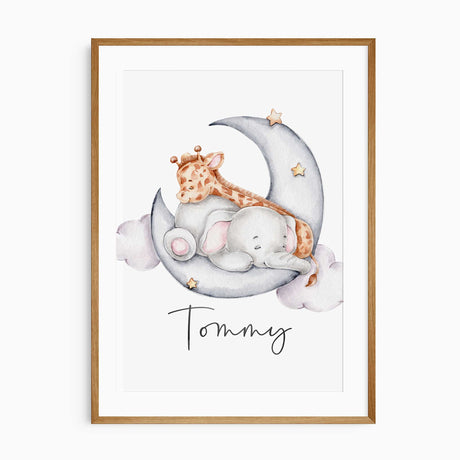 Personalised Tommy name print with a sleeping elephant and giraffe on a blue-grey crescent moon with stars and clouds.