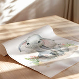 Elephant nursery wall art for girls with soft pink floral details and watercolour safari style