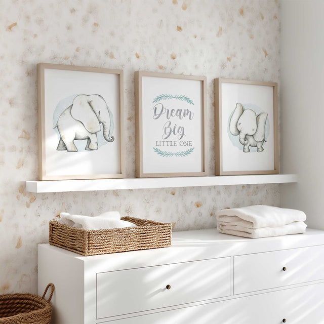 Soft watercolour elephant nursery wall art set for boys featuring gentle grey tones and light blue background.