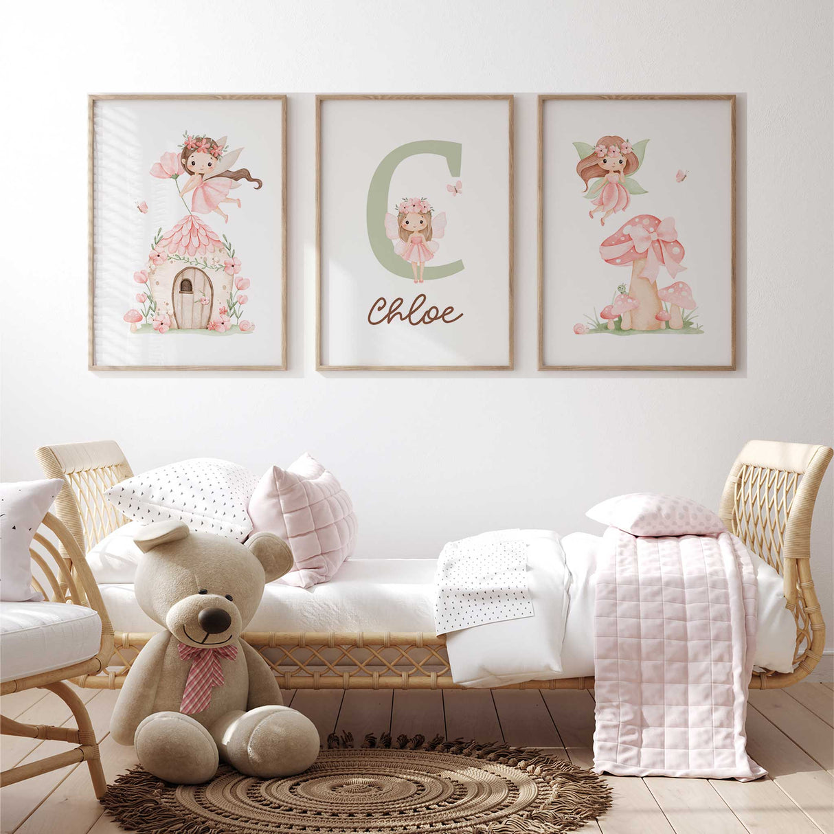Personalised fairy nursery print set featuring a fairy house, custom initial with fairy and name, and pink mushroom scene, designed for girls bedroom décor and soft minimalist pink kids wall art.