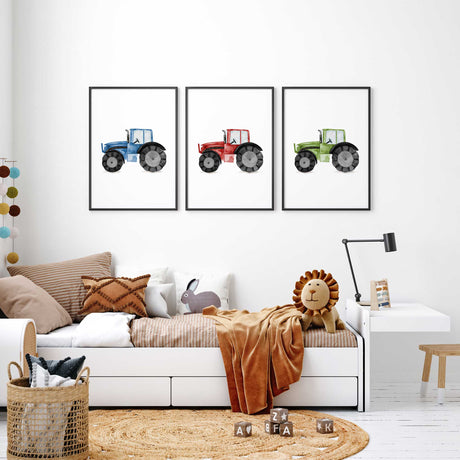 Farm nursery wall art set with blue, red and green tractor prints in a simple watercolour style
