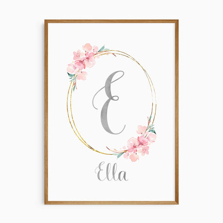 Personalised name print with a grey initial inside a floral oval, pink blossoms and the name beneath