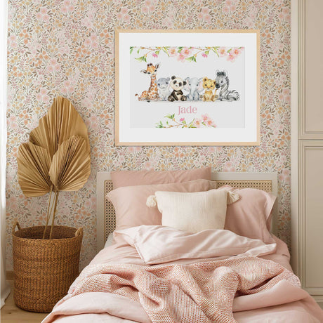 Safari animal nursery print for girls with pink floral branches and personalised name in soft pastel typography