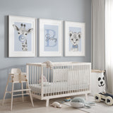 blue background with giraffe and lion nursery print set with personalised initial name artwork