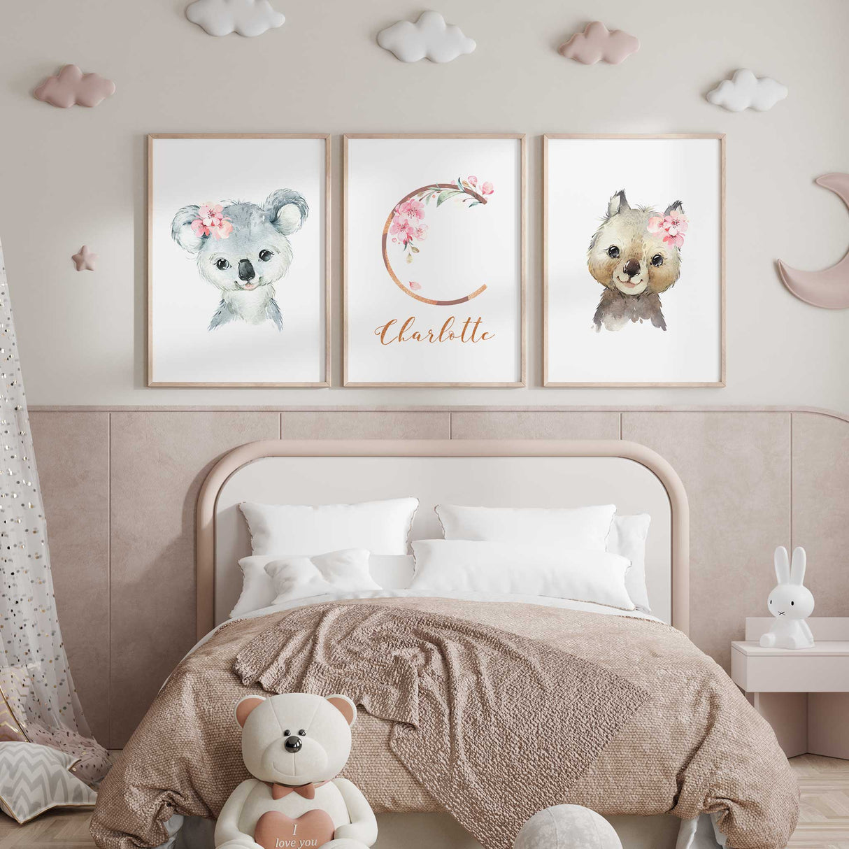 Girls floral animal nursery prints with personalised initial and soft pink botanical accents for baby room styling