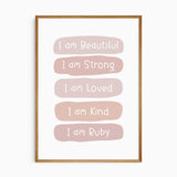 Pink affirmation print with white lettering reading I am Beautiful, Strong, Loved and Kind, ending with I am name