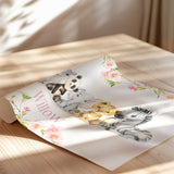 Girls personalised wall art featuring six baby safari animals seated together with custom name and pink blossom details