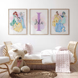 Princess wall art set for girls bedroom with pastel character prints and initial name print