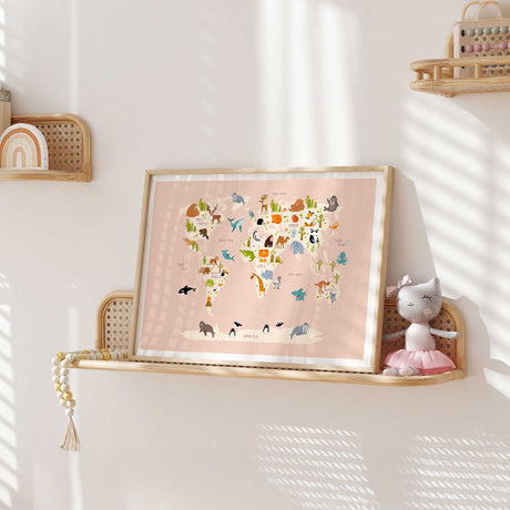 Girls’ room animal world map print with a pink background and bright wildlife illustrations across the continents