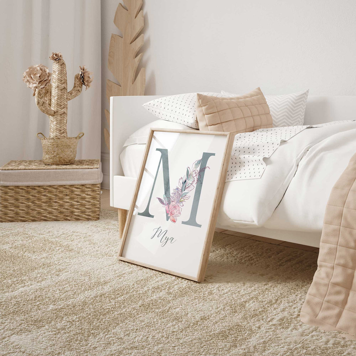Personalised girls room wall art featuring a floral watercolour initial with soft pastel flowers and custom name in elegant script.