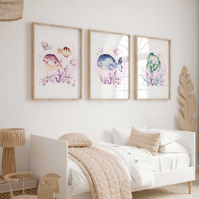 Girls Under the Sea nursery wall art set of 3 featuring pink whale, turtle, and fish watercolour prints for coastal girls room decor.