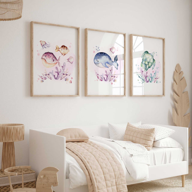 Girls Under the Sea nursery wall art set of 3 featuring pink whale, turtle, and fish watercolour prints for coastal girls room decor.