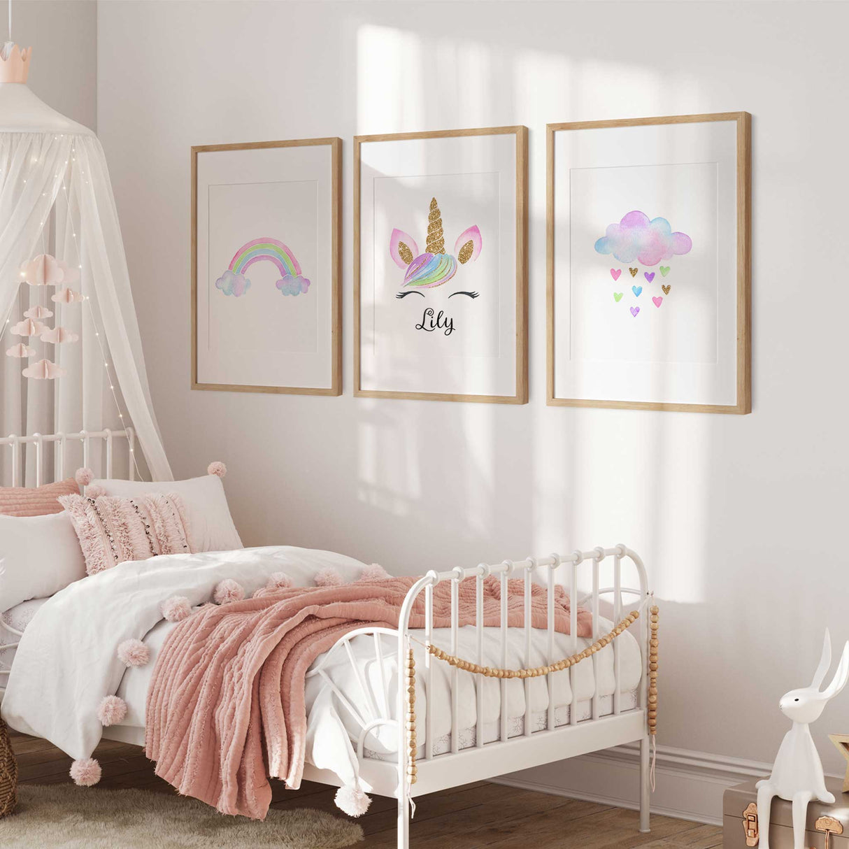 Customisable nursery wall art set featuring a rainbow, unicorn, and cloud with hearts, ideal for beby girl room decor.