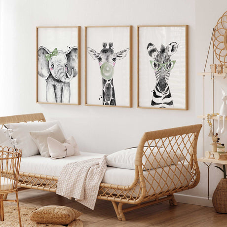 green safari animal wall art set designed for baby girl nursery featuring zebra giraffe and elephant illustrations