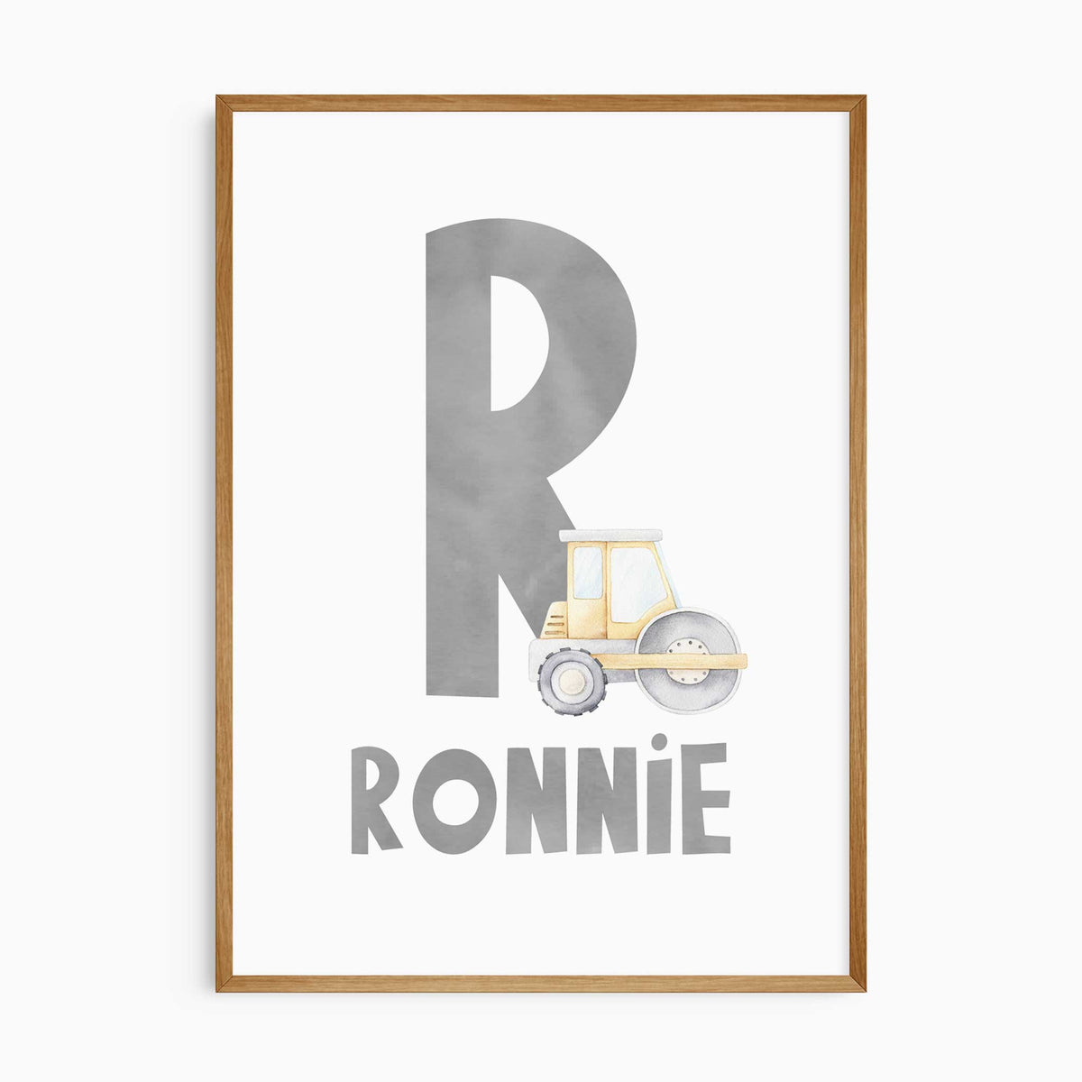 Personalised construction name print with a large grey initial, the name and a yellow watercolour road roller.