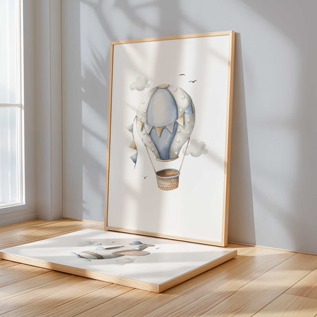 Blue and beige hot air balloon nursery wall art with clouds and bunting design.