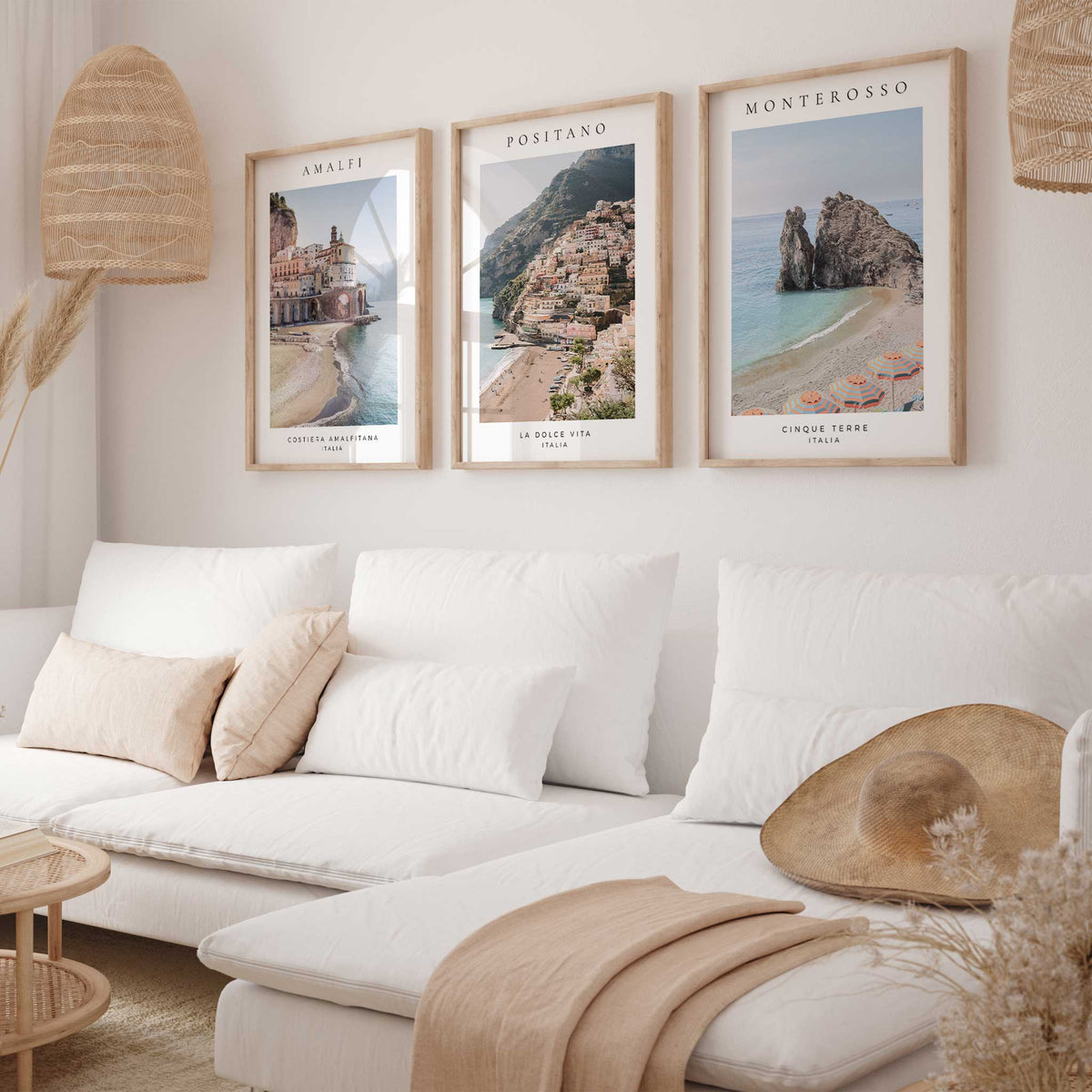Italian coastal print trio showing pastel buildings, blue water and striped beach parasols, with black place names.