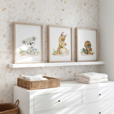 Australian animal nursery wall art set featuring a koala with joey, kangaroo with joey and platypus print in soft neutral watercolour tones for baby room decor