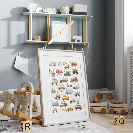 Watercolour transport alphabet with cars, trucks, bikes and a locomotive, each paired with a letter and vehicle name.