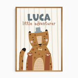 Personalised leopard print with a child’s name, party hat and little adventurer wording on a softly striped background.