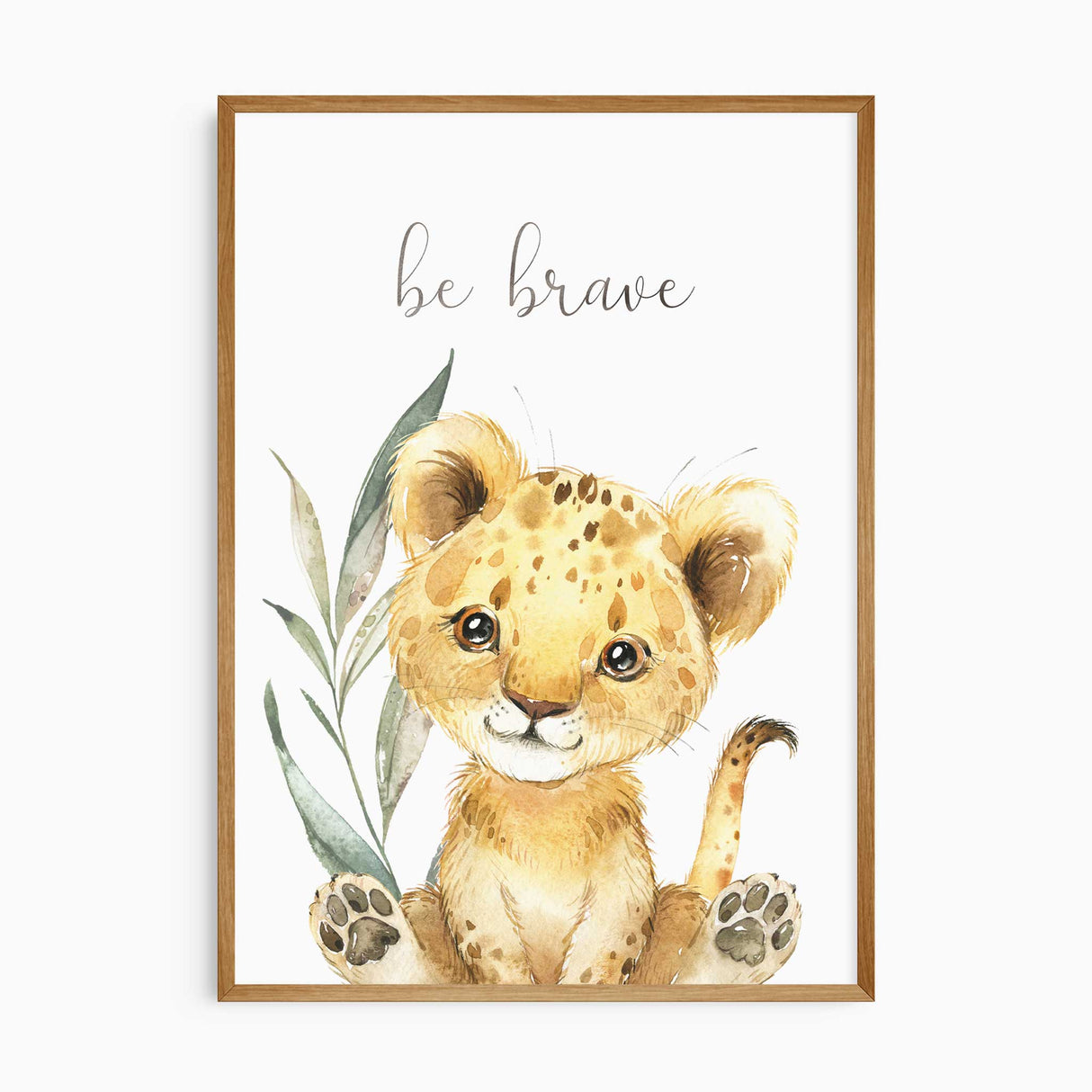 Nursery print of a cute lion cub with "be brave" inspirational quote, ideal safari decor