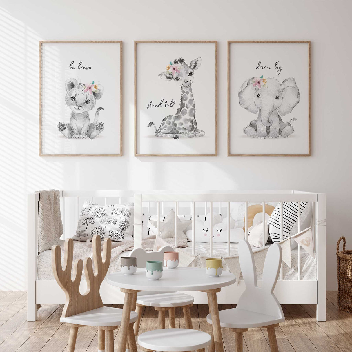Girls safari wall art set with floral crowned animals and positive sayings, perfect for baby nursery or kids room.