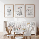 Girls safari wall art set with floral crowned animals and positive sayings, perfect for baby nursery or kids room.