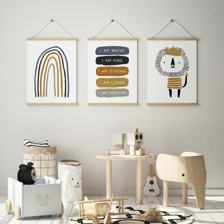 Rainbow, personalised affirmation and crowned lion prints in mustard, grey and black.