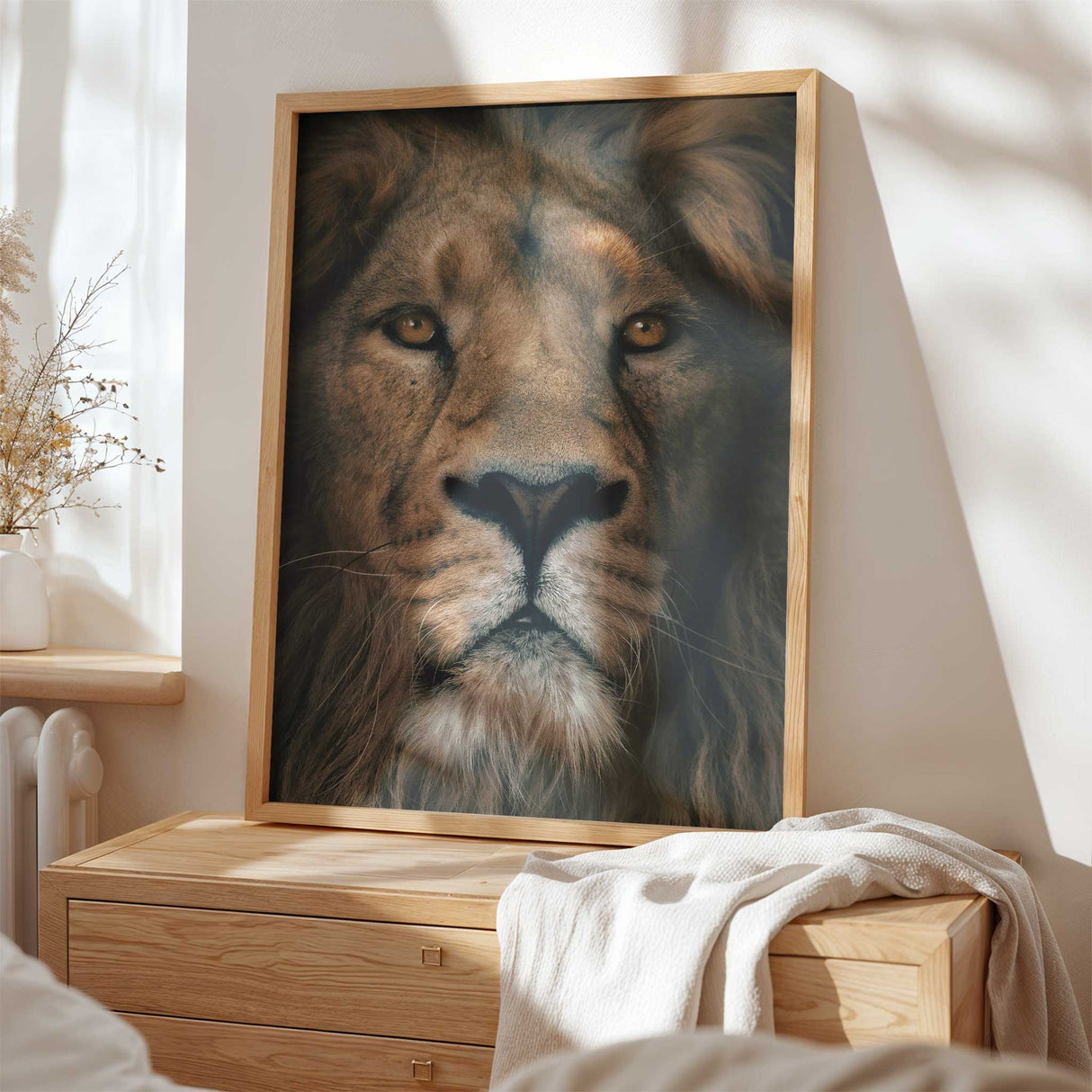 Detailed lion's face with focus on the fur and mouth, presented in a wooden frame.