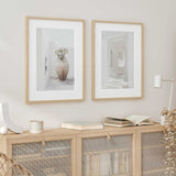 two piece mediterranean art set with bright white buildings and warm earthy accents