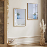 Mediterranean wall art set of two featuring blue plant pots against softly weathered white and pale blue walls