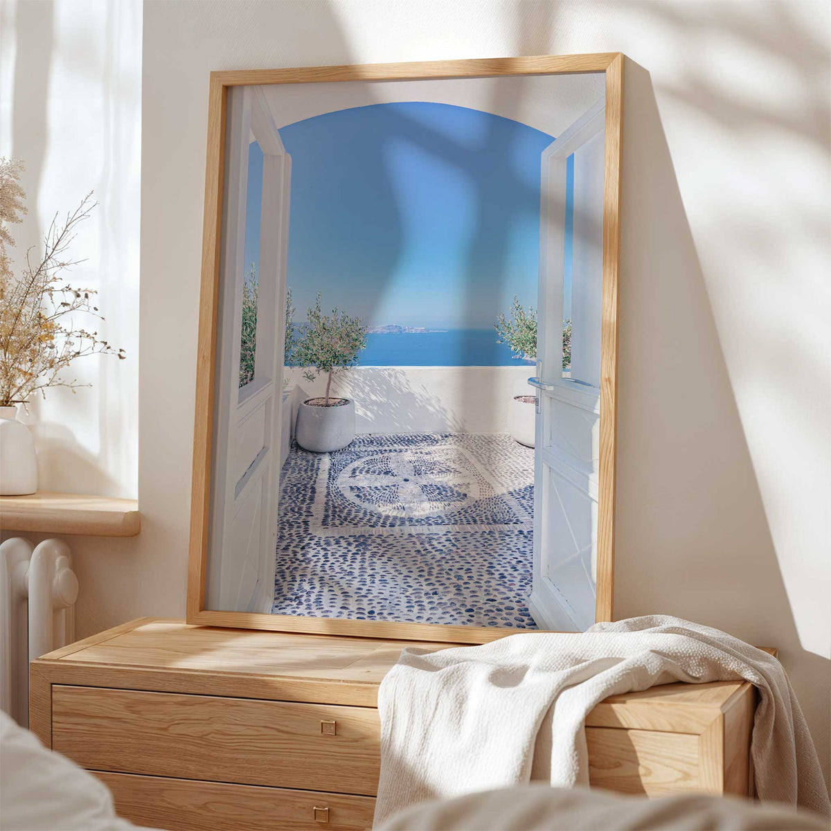 Mediterranean wall art print of a Greek island terrace with white architecture and expansive blue sea beyond