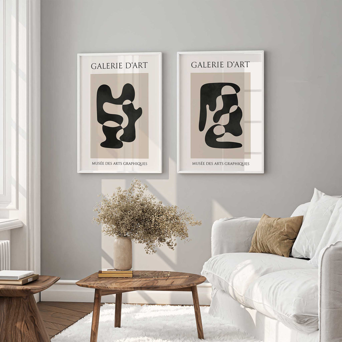 Coordinating abstract prints with contrasting black organic shapes, beige backgrounds and cream typography surrounds.