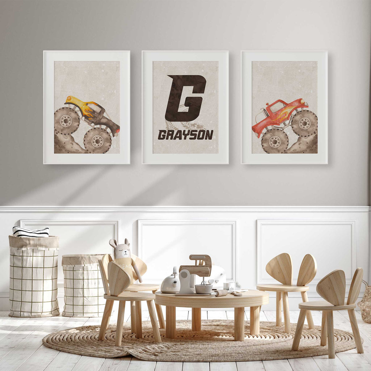 Yellow and red monster truck prints with a personalised Grayson initial print and tyre tracks on pale beige backgrounds.
