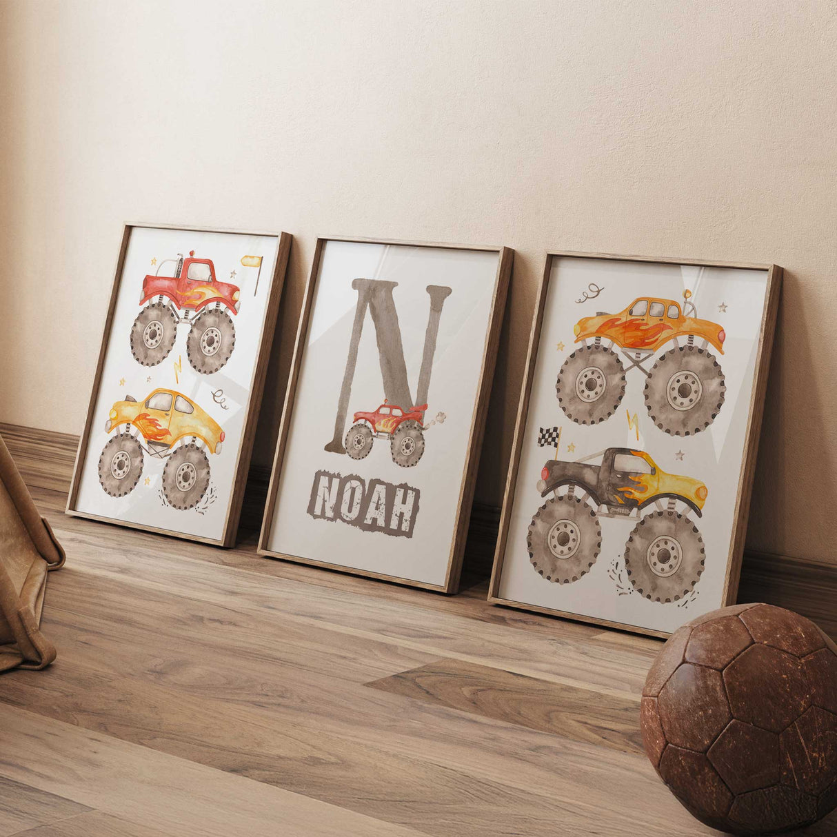 Personalised monster truck wall art set featuring racing flags, oversized tyres, flames and bright vehicle illustrations.