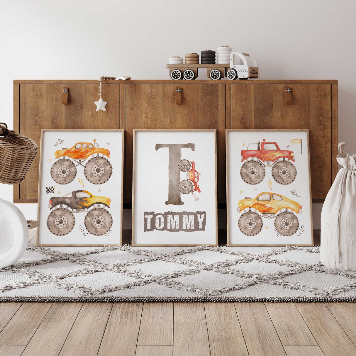 Set of three monster truck prints with flame details and personalized name artwork, ideal for boys bedrooms or nursery walls.