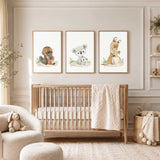Mother koala, kangaroo and platypus with their babies, illustrated in watercolour with small green plants on white.