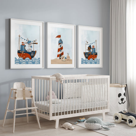 Three nautical animal prints featuring a bunny with a telescope, a teddy bear sailor and a seaside lighthouse scene.