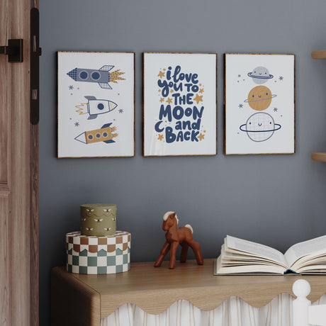 Navy space nursery decor prints with rockets, stars and moon quote design