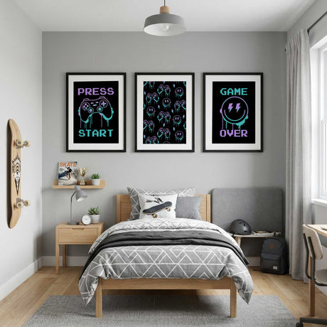 Three framed neon gaming prints displayed together in a boys bedroom with colourful video game designs