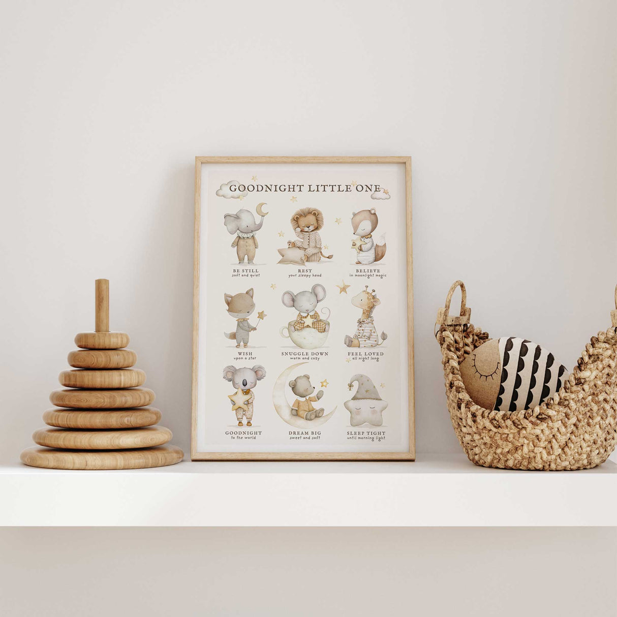 Neutral animal nursery print with elephant, lion, fox, giraffe and koala in soft beige and cream tones.