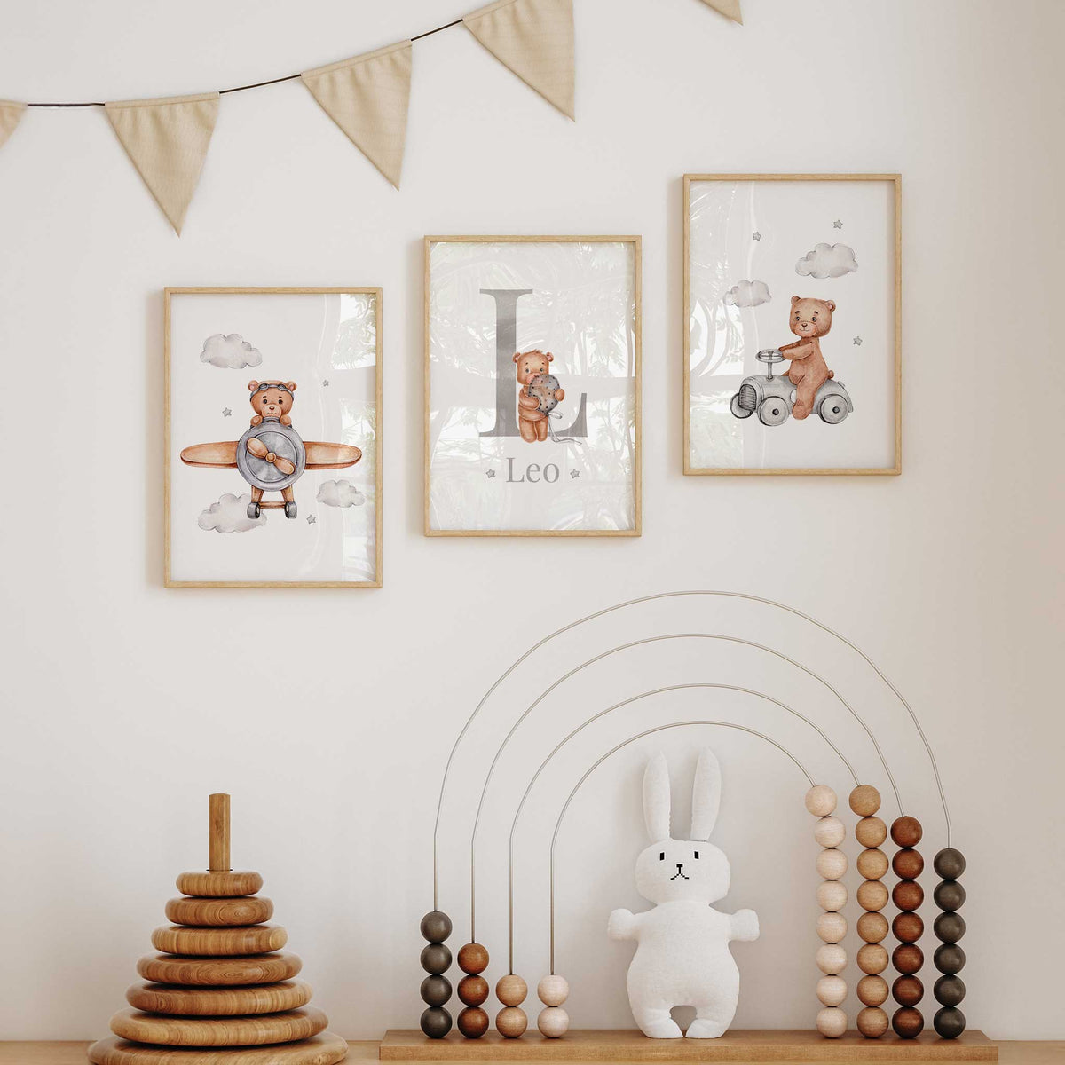 Bear nursery prints with a pilot bear, grey initial and name with balloon bear, and bear riding a grey toy car.
