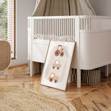 Neutral construction nursery wall art print featuring tractor, truck and dump truck illustrations in soft beige tones