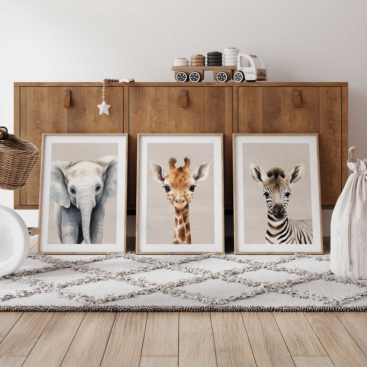 Neutral safari animal nursery wall art set featuring baby lion, elephant, giraffe and zebra prints in modern Scandinavian kids room decor.