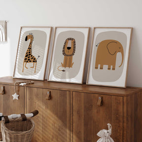 Safari-themed nursery wall art set featuring cute elephant, giraffe, and lion designs.